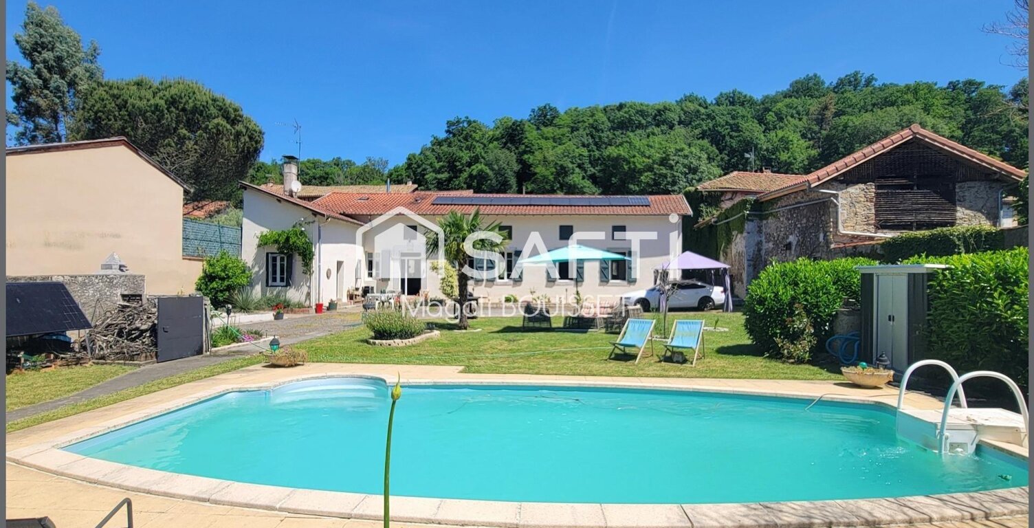 Belle prestation, maison T4 de 138m² et son studio T1 environ 28m², combles, terrasses, cour, abris couverts, garage, atelier, grange, bassin, jardin, puits, piscine au sel. — photo 1