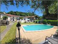 Belle prestation, maison T4 de 138m² et son studio T1 environ 28m², combles, terrasses, cour, abris couverts, garage, atelier, grange, bassin, jardin, puits, piscine au sel. — photo 3