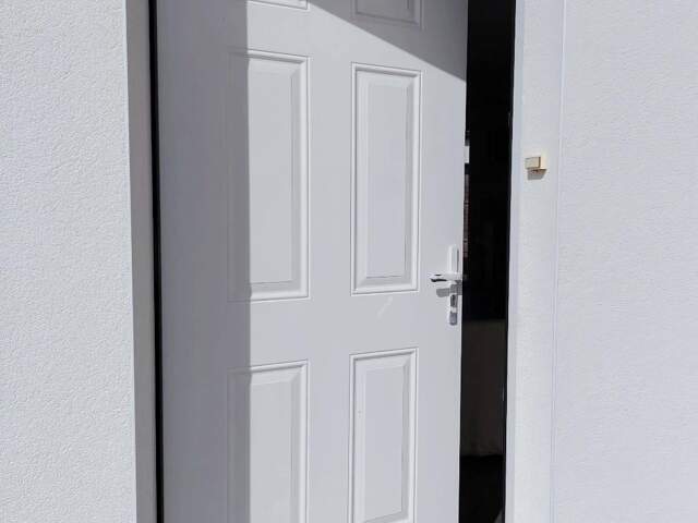 Maison de plain pied avec garage et jardin, au calme. — photo du bien