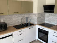 APPARTEMENT RÉCENT EN DUPLEX AVEC JARDIN — photo 2