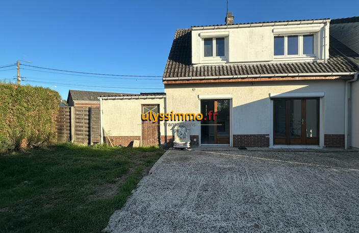 maison de trois chambres avec garage terrasse et jardin — photo 2