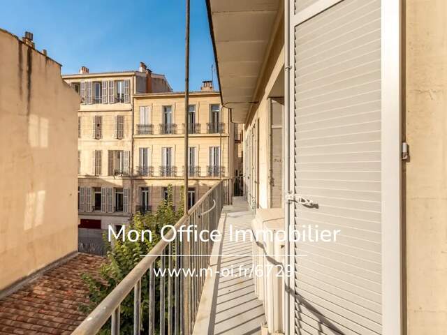 Référence : 6729-AFO. - Appartement 7 pièces avec balcon dans le 6eme arrondissement — photo du bien