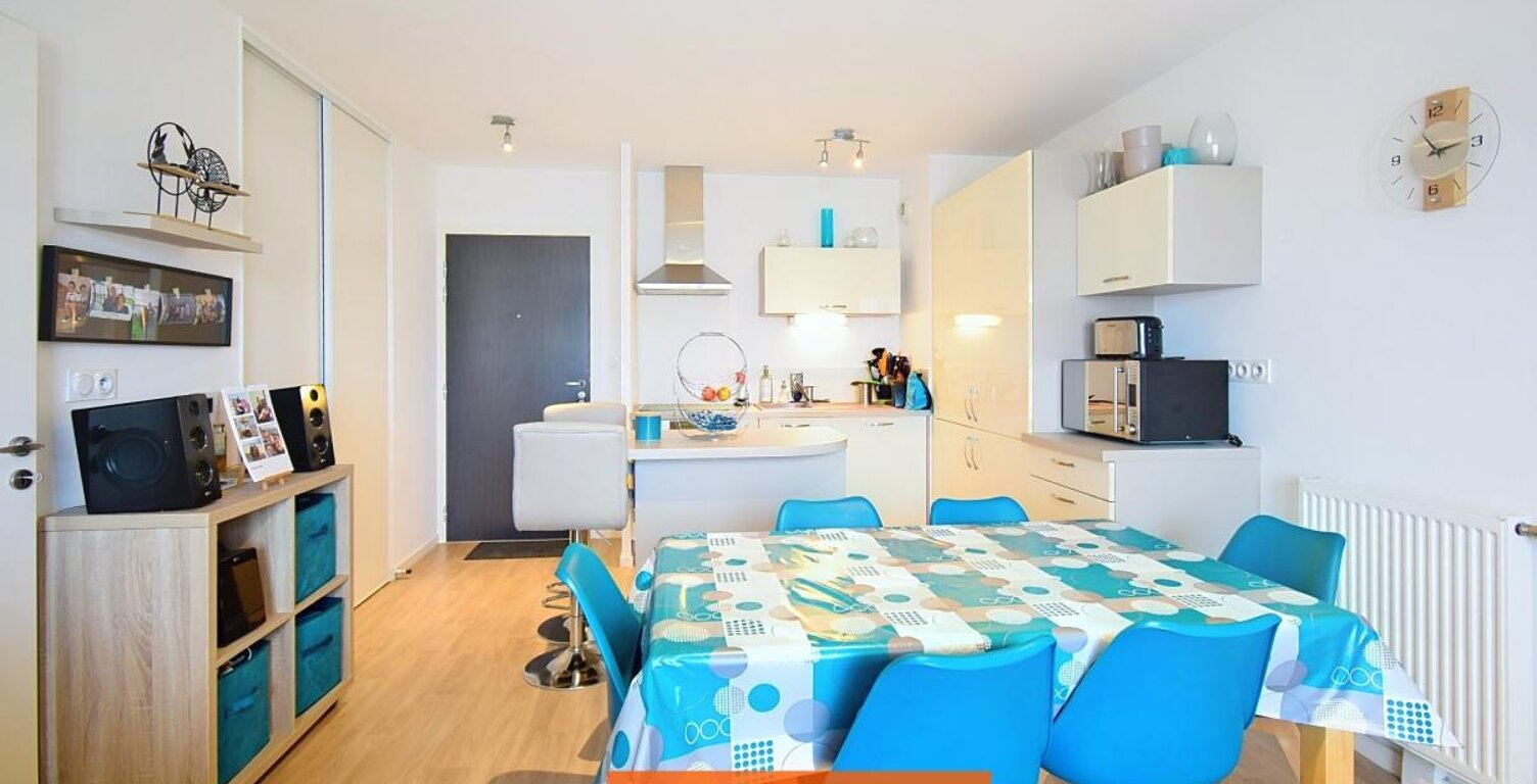 Bourgbarré (35) – Appartement 44 m² : balcon, ascenseur et garage fermé en sous-sol — photo 1