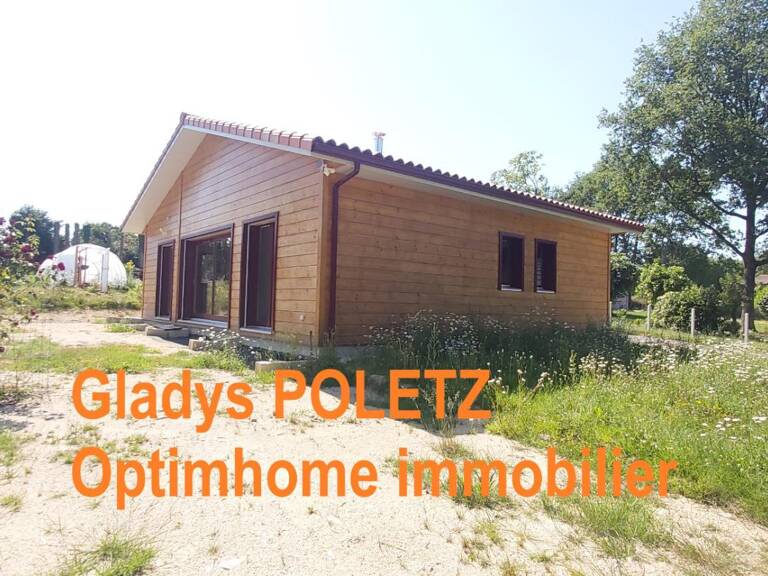 MAISON OSSATURE BOIS PLAIN-PIED + DEPENDANCES — photo 1