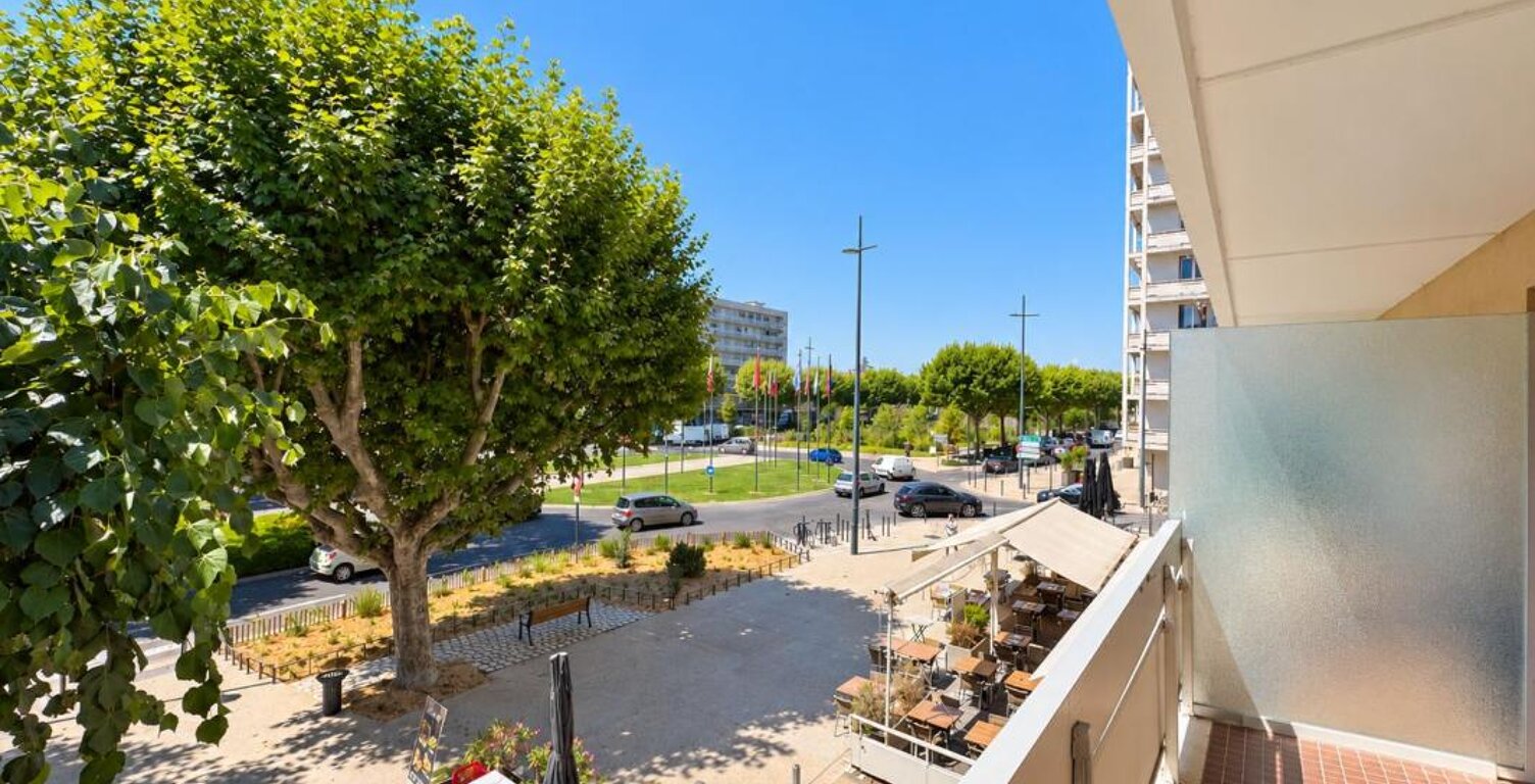À VENDRE – Appartement 54 m² avec garage et balcon – Hyper centre — photo 1