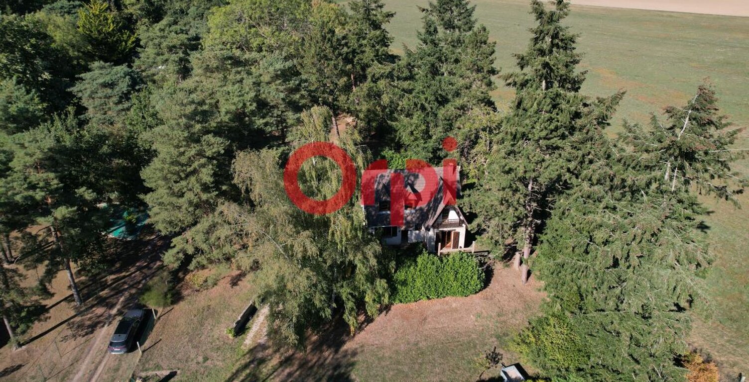 Maison familiale de 105 m² avec suite parentale, sous-sol total et grand terrain de 2 200 m² — photo 1