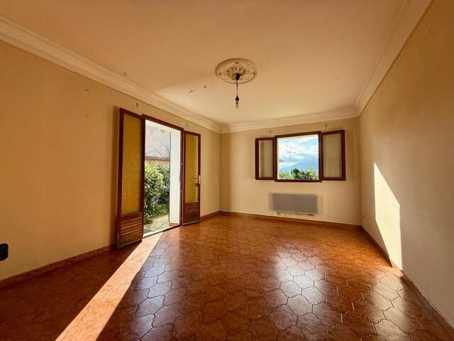 Appartement T3 79m² avec jardin - FURIANI — photo du bien