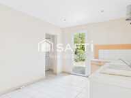 Maison de plain-pied  130 m²  2 chambres  Garage, préau et jardin sans vis-à-vis — photo 4