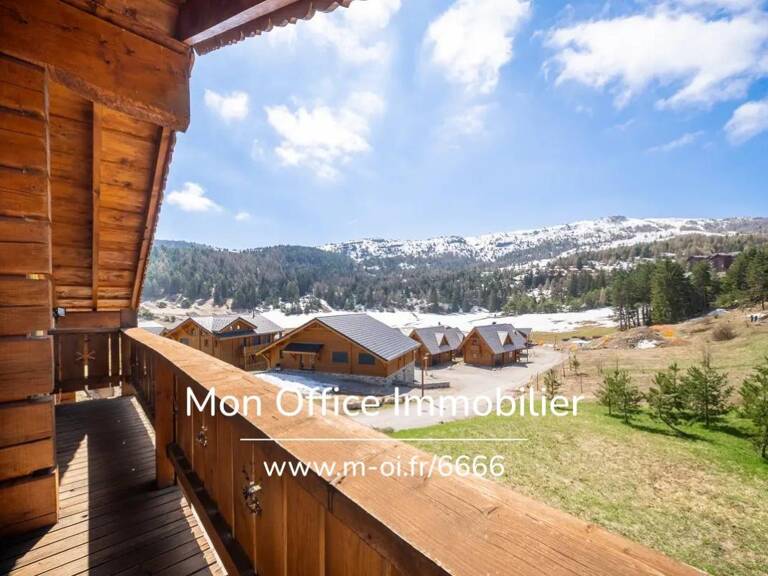 Référence : 6666-CLG - Chalet de type 7 en madrier de 240m² sur une parcelle de 1500m² à La Joue du Loup — photo 1
