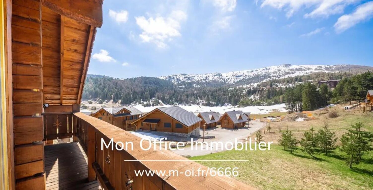 Référence : 6666-CLG - Chalet de type 7 en madrier de 240m² sur une parcelle de 1500m² à La Joue du Loup — photo 1