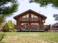 Référence : 6666-CLG - Chalet de type 7 en madrier de 240m² sur une parcelle de 1500m² à La Joue du Loup — photo 2