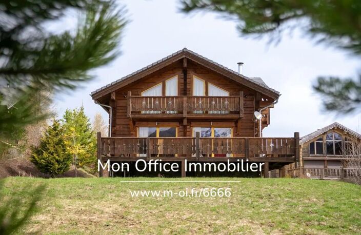 Référence : 6666-CLG - Chalet de type 7 en madrier de 240m² sur une parcelle de 1500m² à La Joue du Loup — photo 2