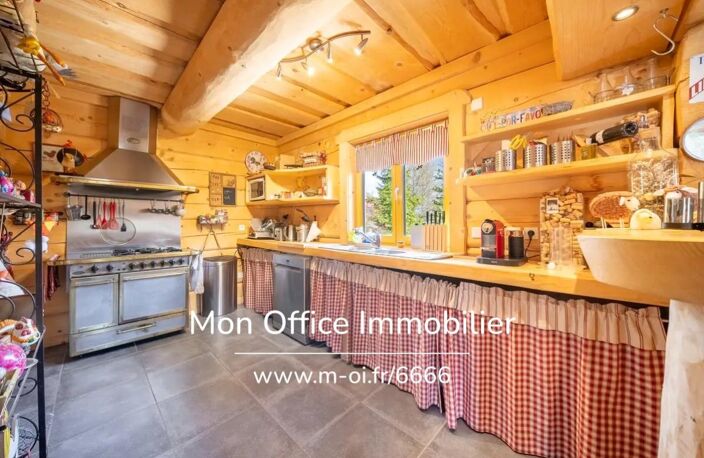Référence : 6666-CLG - Chalet de type 7 en madrier de 240m² sur une parcelle de 1500m² à La Joue du Loup — photo 3