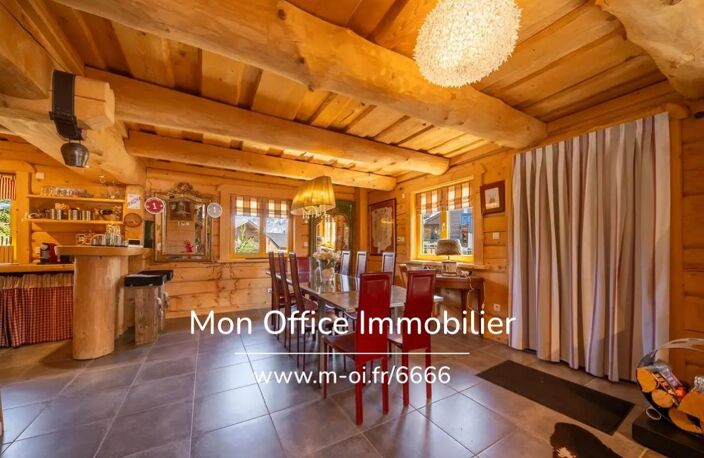 Référence : 6666-CLG - Chalet de type 7 en madrier de 240m² sur une parcelle de 1500m² à La Joue du Loup — photo 4