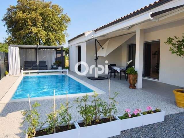 Maison récente - 108m² - 3 chambres - Garage - Carport - Piscine — photo du bien