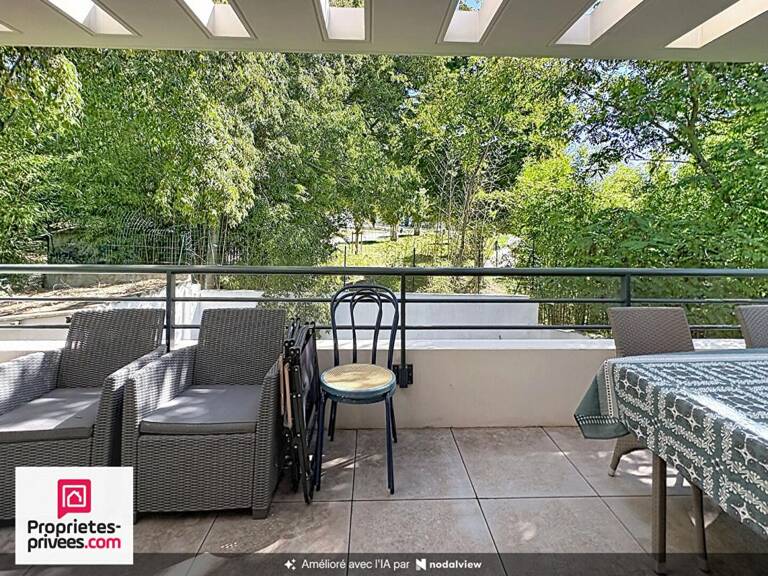 Appartement T4 dernier étage avec deux terrasses et garage — photo 1