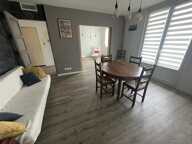 Appartement F3, 1 er étage sur 3, grand balcon, cave — photo 2