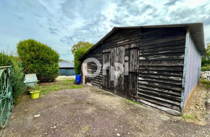 TERRAIN CONSTRUCTIBLE AVEC GARAGE – BOURG DE MARZAN – 556 m² — photo 3
