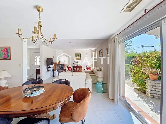 Maison de plain-pied de 105 m² sur terrain de 891 m² proche de toutes les commodités à pied — photo du bien