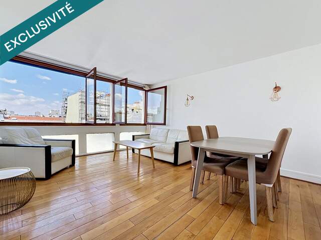 Vue dégagée sur les toits de Paris - 3 chambres — photo du bien