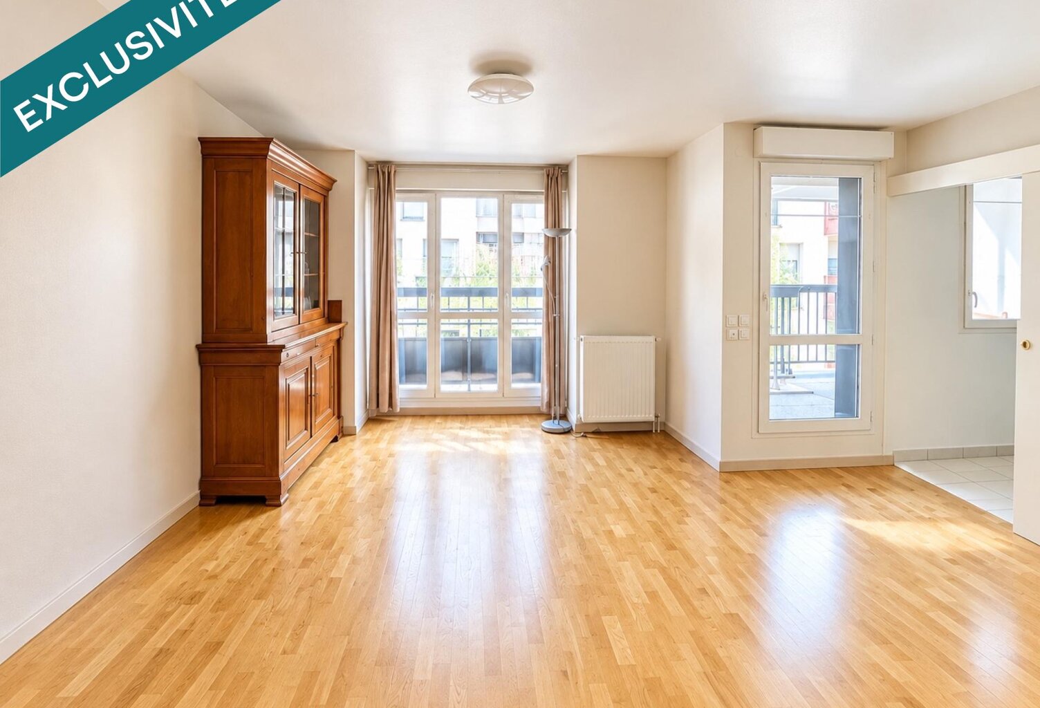 LA PLAINE - APPARTEMENT AVEC BALCON ET PARKING — photo 1