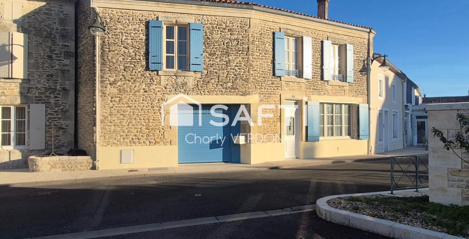 Maison avec étage en plein bourg de Loulay — photo 1