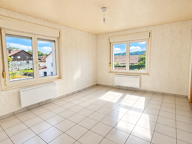 TREVILLERS - APPARTEMENT F3 AVEC GARAGE — photo 2