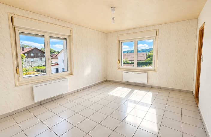 TREVILLERS - APPARTEMENT F3 AVEC GARAGE — photo 2