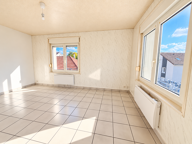 TREVILLERS - APPARTEMENT F3 AVEC GARAGE — photo 3