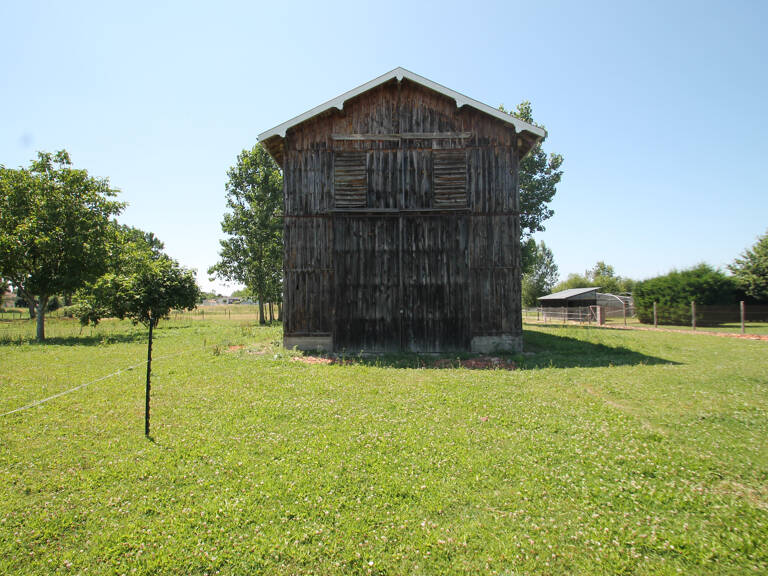 Ancien séchoir à tabac – 83 m² – Terrain de 5 428 m² – Potentiel de réhabilitation en habitation proche de CASTELJALOUX (47) — photo 1