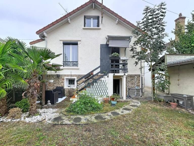 LES PAVILLONS-SOUS-BOIS – MAISON INDIVIDUELLE – JARDIN – GARAGE — photo 1