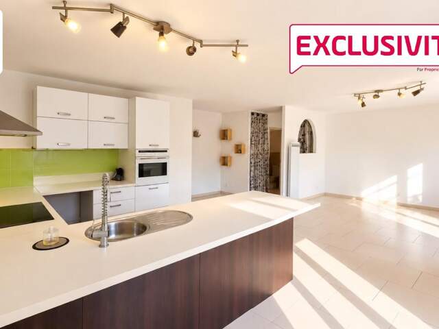 Grand appartement 2 pièces 64.64 m2  Carrez avec GARAGE en sous-sol et CAVE — photo du bien