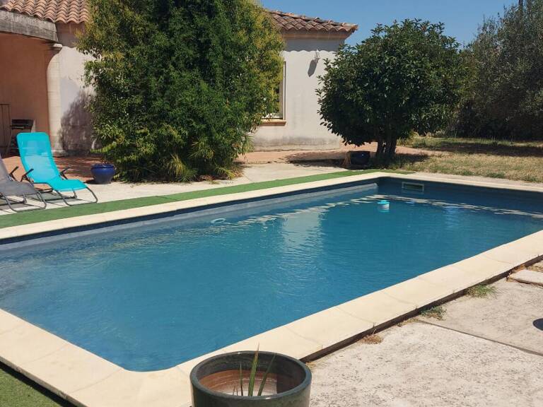 GARD. 30. GENERAC. Belle maison de 184 m2 de plain-pied sur terrain arboré de 1264 m² avec piscine — photo 1