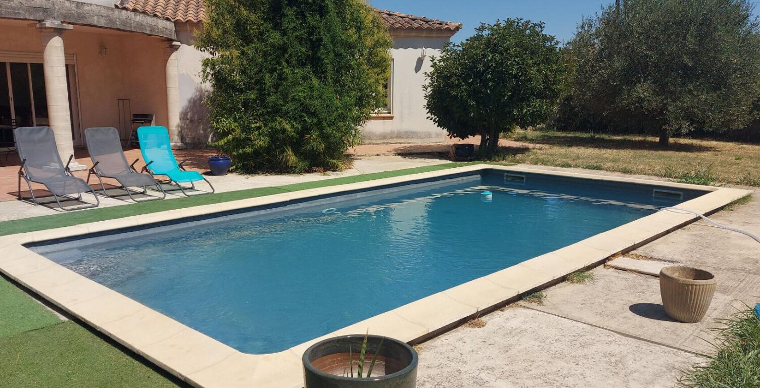 GARD. 30. GENERAC. Belle maison de 184 m2 de plain-pied sur terrain arboré de 1264 m² avec piscine — photo 1