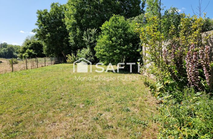 Terrain viabilisé, plat et vue dégagée au cœur du village ! — photo 5
