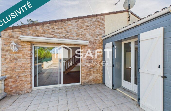 Maison de plain-pied avec jardin arboré et garage — photo 4