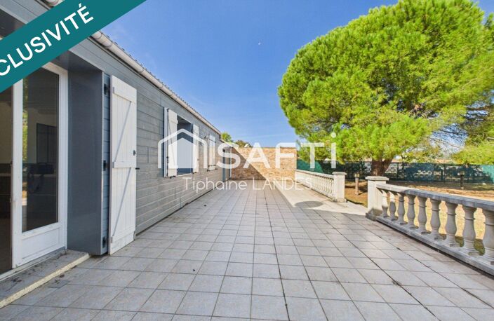 Maison de plain-pied avec jardin arboré et garage — photo 5