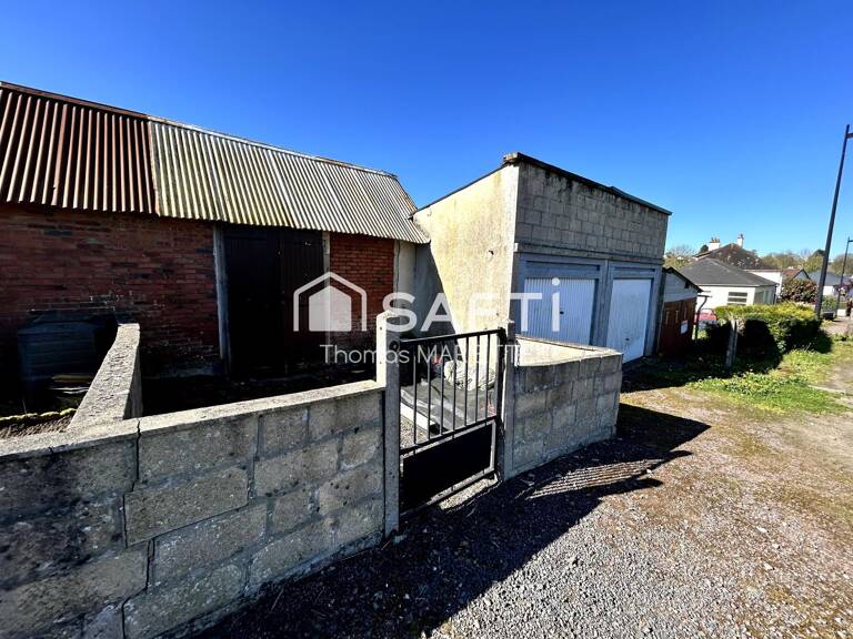 Garage avec cave, remise et terrasse — photo 1
