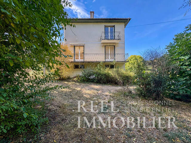 Maison des années 70 avec jardin arboré de 1 000 m² / Proche de l'IUT d'Auch — photo du bien