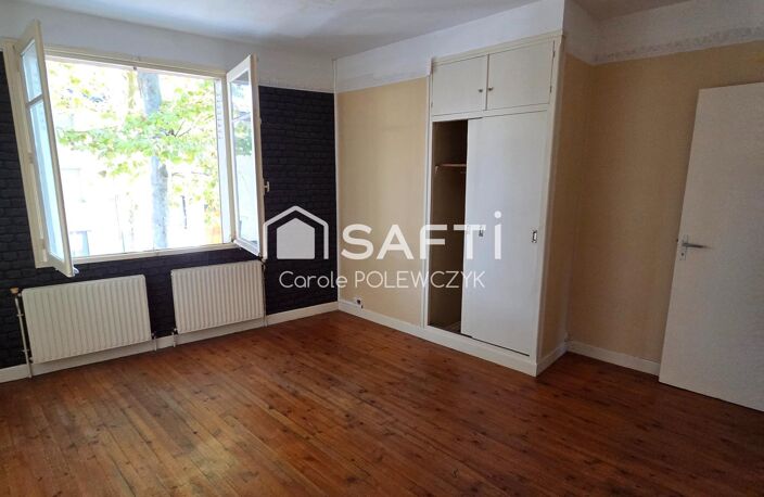 MAISON DE VILLE AVEC GARAGE : BEAU POTENTIEL A REVELER — photo 4
