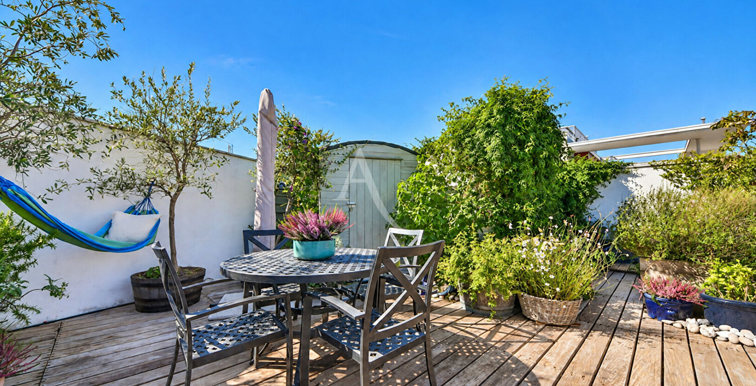 Duplex en dernier étage avec jardin paysager — photo 1