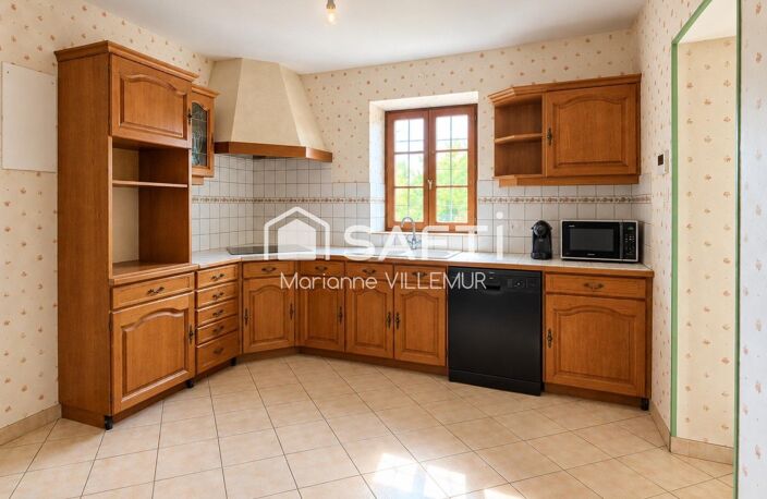 A Vianne, maison en pierre de plain pied, de 125 m² habitables avec dépendances sur un terrain de 9115 m² — photo 4