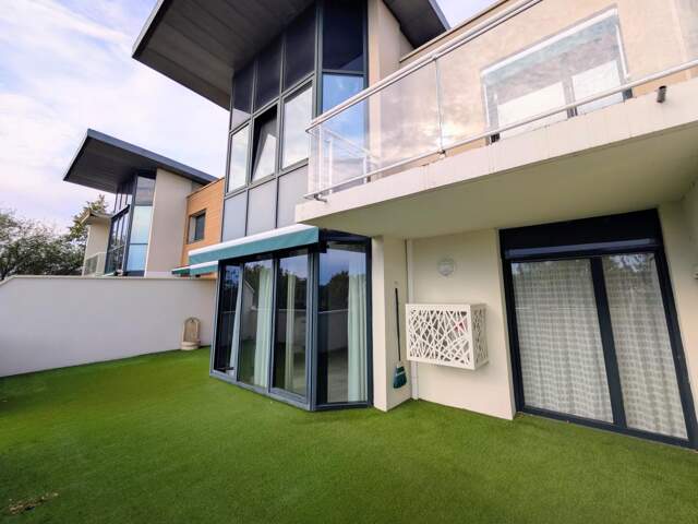 APPARTEMENT T4bis - garages - terrasse — photo du bien