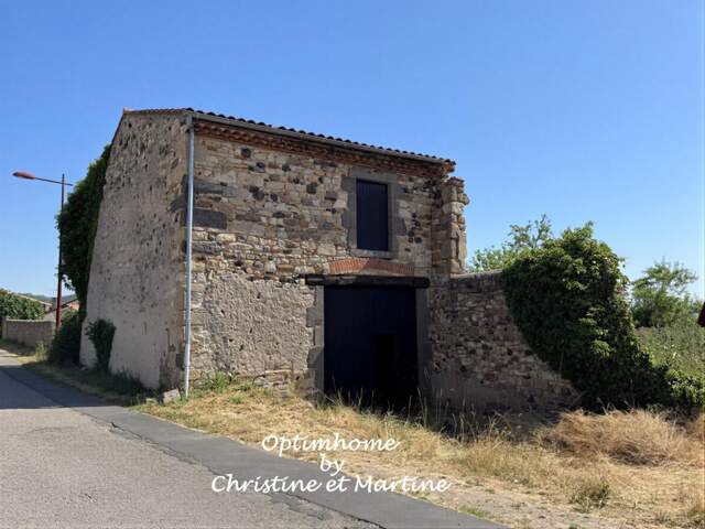 GRANGE EN PIERRE A CHAMPEIX : BEAU POTENTIEL — photo du bien