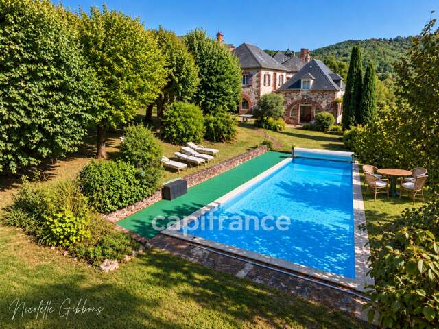 EXCLUSIVITÉ – BELLE DEMEURE DE CARACTÈRE AVEC GRAND PARC ET PISCINE AU CŒUR DE MEYSSAC — photo du bien
