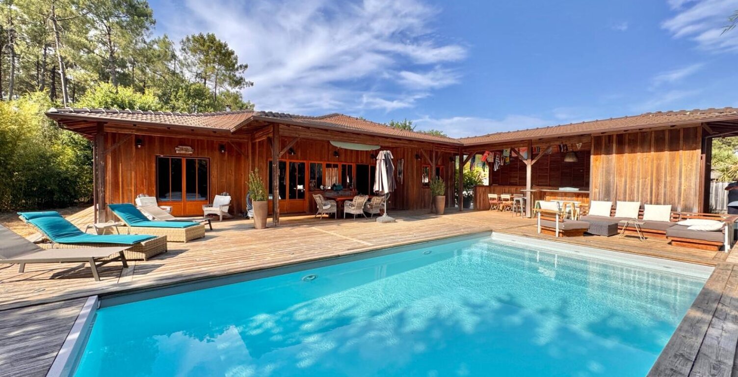 Villa bois de plain-pied avec piscine — photo 1