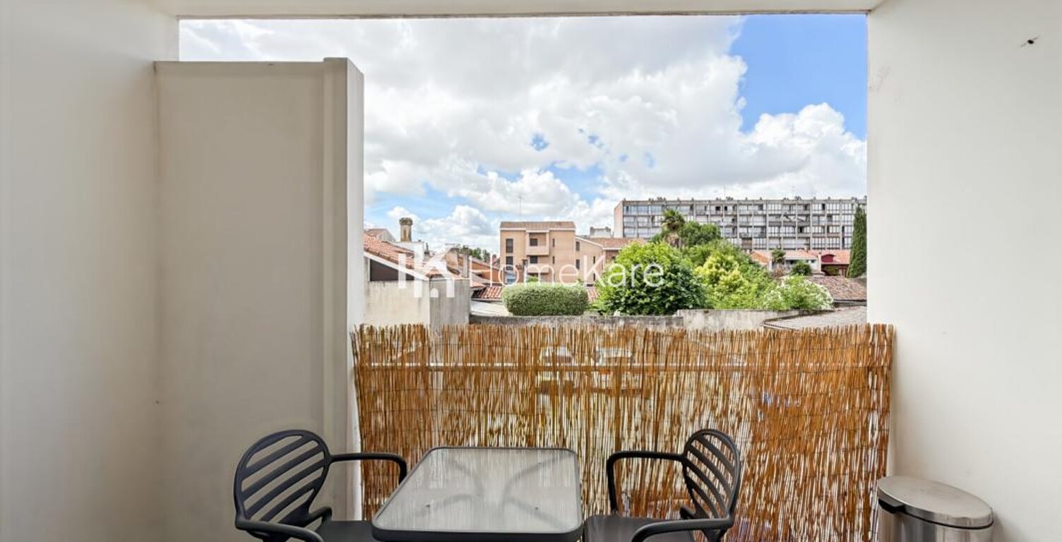T1 bis avec balcon en centre-ville — photo 1