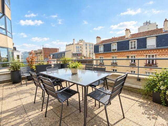 Bureaux à louer de 167 m² à Boulogne Billancourt. Immeuble moderne, proche transports et commerces, terrasse et climatisation réversible — photo du bien