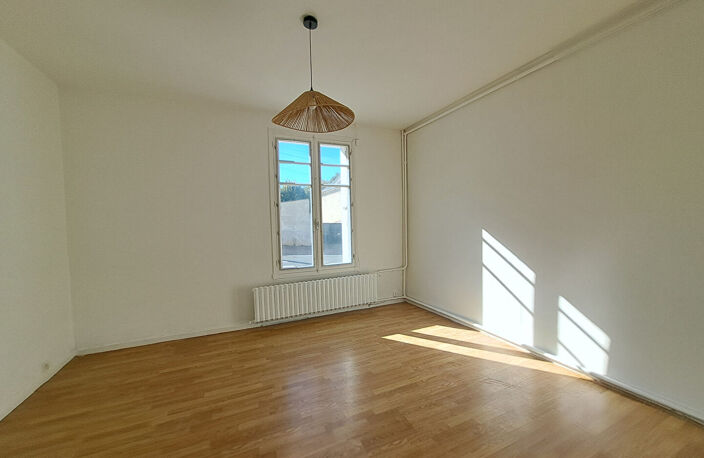MAISON DE VILLE AVEC JARDIN ET GARAGE — photo 4