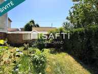 MAISON FAMILIALE 100 m² AVEC JARDIN, DÉPENDANCE ET GARAGE — photo 2